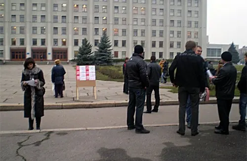 Активісти НАС провели акцію «Справжнє обличчя влади» у містах України